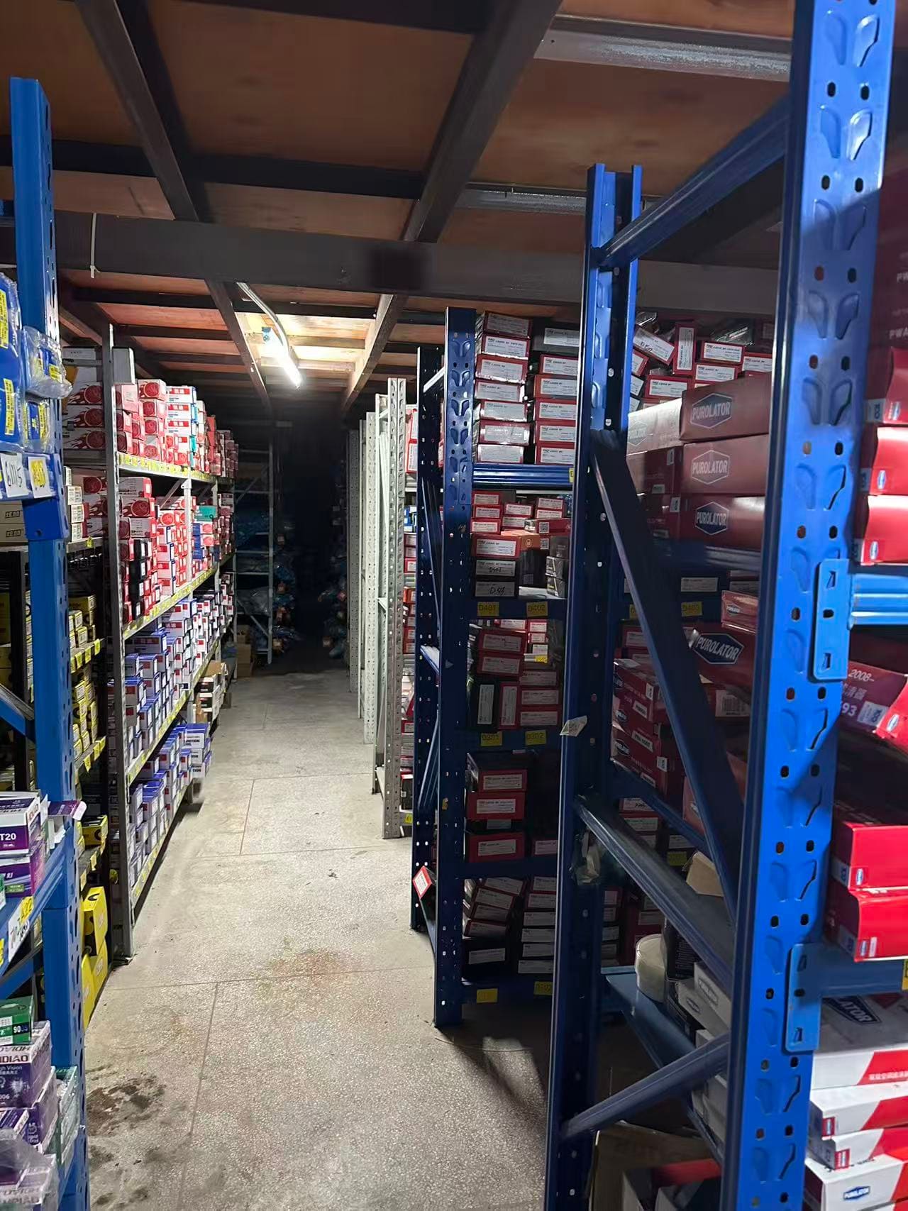Shelving and packaged vehicle parts in a warehouse